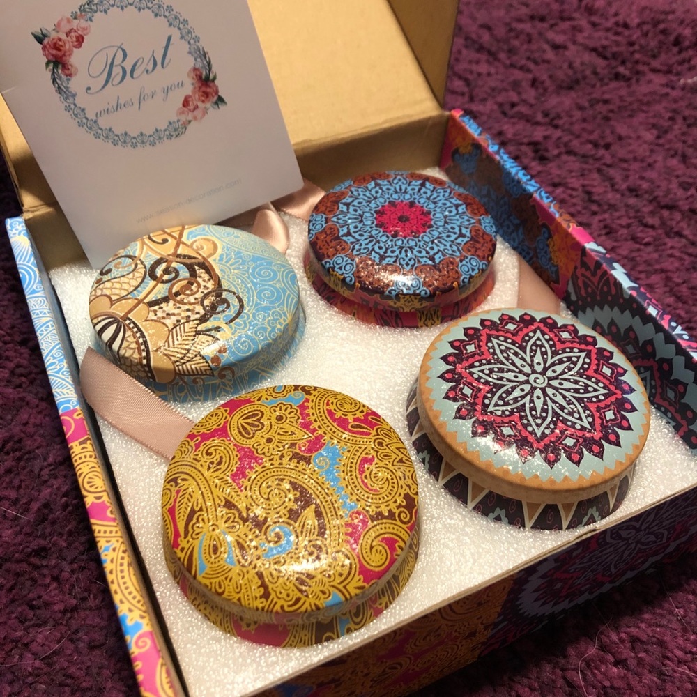 Four scented candles NIB